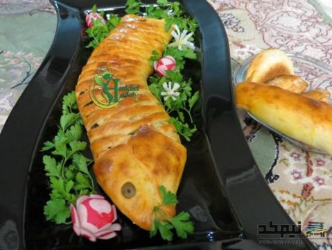 ﻿ پیراشکی تن ماهی به شکل ماهی